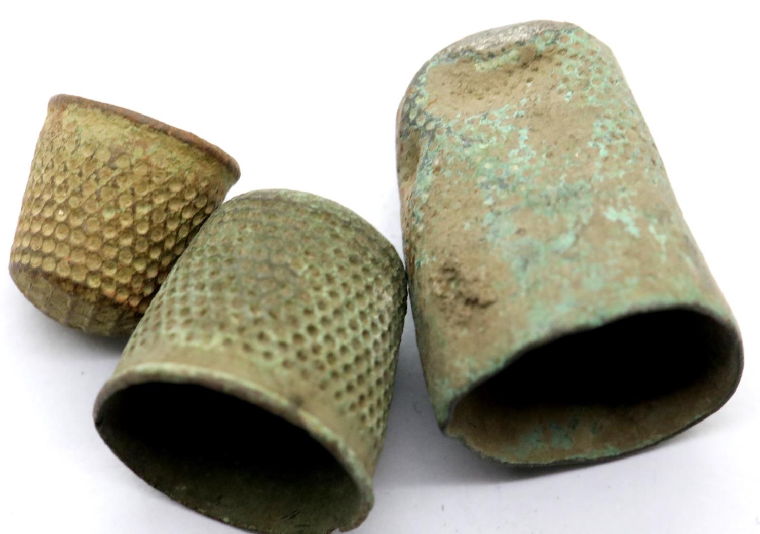 Three Bronze thimbles. P&P Group 1 (£14+VAT for the first lot and £1+VAT for subsequent lots)