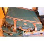 Two large travel suitcases. Not available for in-house P&P, contact Paul O'Hea at Mailboxes on 01925