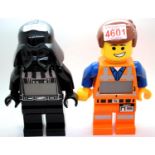 Two Lego alarm clocks, Star Wars and Lego Movie. P&P Group 2 (£18+VAT for the first lot and £3+VAT