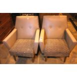 Pair of retro leatherette upholstered low seated lounge chairs. Not available for in-house P&P,