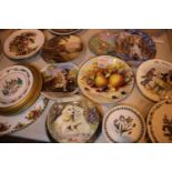 Large collection of decorative cabinet plates including Royal Albert and an Old Country Roses