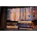 Tub of assorted DVDs, Blu-Rays and video cassettes. Not available for in-house P&P, contact Paul O'