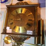 Primus oak cased twin weight chain driven wall clock, working at time of lotting, dial D: 21 cm. Not