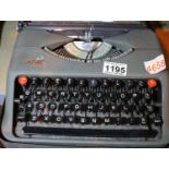 Vintage Empire Aristocrat typewriter with metal casing. Not available for in-house P&P, contact Paul