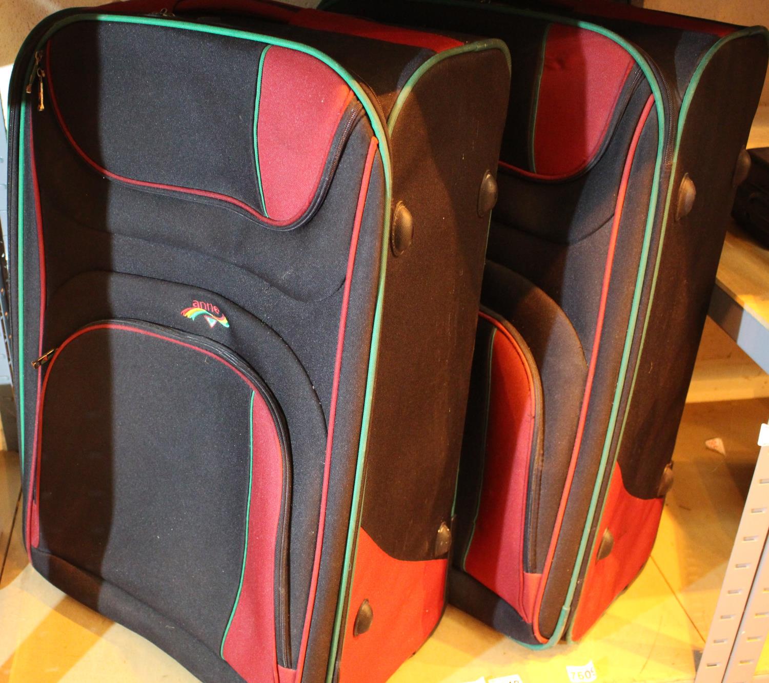 Two large canvas suitcases. Not available for in-house P&P, contact Paul O'Hea at Mailboxes on 01925