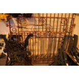 Pair of red wrought iron garden gates, W: 120 cm, H: 110 cm. Not available for in-house P&P, contact