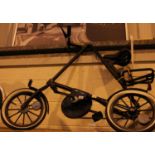 Unusual adult unisex Strida folding bike with belt drive and drum brakes. Not available for in-house