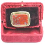 A boxed large Victorian mourning brooch, rectangular form having a large panel of agate, and