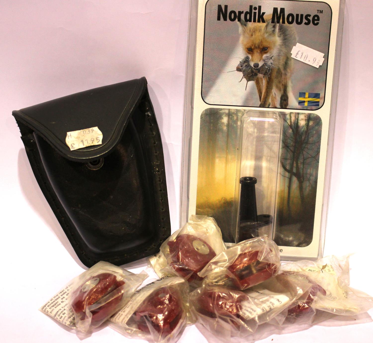 Six new old stock trigger locks, Nordik Mouse and a leather holster. P&P Group 2 (£18+VAT for the