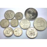 Quantity of USA dollars, half dollars, further coins and a Kennedy token. P&P Group 1 (£14+VAT for