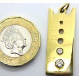 18ct gold diamond sizing gauge pendant, set with .1 and .25cts diamonds, 8.2g. P&P Group 1 (£14+