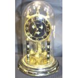 Kundo anniversary clock with glass dome, H: 31 cm. Not available for in-house P&P, contact Paul O'