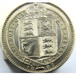 1887 - Silver Shilling of Queen Victoria in a high grade. P&P Group 1 (£14+VAT for the first lot and