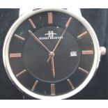 New boxed gents Henry Bridges black faced gold coloured wristwatch, working at lotting. P&P Group