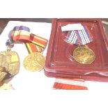 A collection of world medals, including British, Russian, Pakistani, French and Masonic examples.