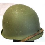 WWII US M1 McCord helmet with a 1944 serial number and WWII Westinghouse liner. Good condition but