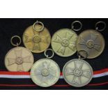 Five German WWII unissued Merit medals with length of ribbon. P&P Group 1 (£14+VAT for the first lot