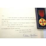 RAYMOND G GARRETT ESQ, a British issued Post-War boxed Medal of the Order of Merit of the Federal