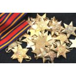 Thirty British WWII unissued restrike Burma stars, with a length of ribbon. P&P Group 1 (£14+VAT for