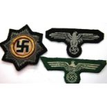 German WWII re-enactment embroidered cloth Deutsches Kreuz in gold, and two embroidered cap / breast