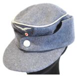 German WWII re-enactment Luftwaffe M35 field cap, badged with silver NCO braid. P&P Group 1 (£14+VAT