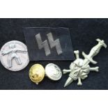 German WWII SS badge, further buttons and an SS collar flash, all most likely early reproduction.