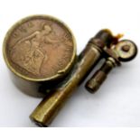 British WWI trench-art cigarette lighter, the body formed from two George V pennies, flint marked