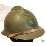 French WWI aged representation Adrian helmet, badged for the French Artillery. P&P Group 2 (£18+