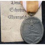 German WWII West Wall Medal, un-issued and with its packet of issue. P&P Group 1 (£14+VAT for the