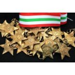 Twenty British WWII unissued Italy stars, with a length of ribbon. P&P Group 1 (£14+VAT for the