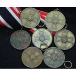 Seven German WWII unissued Merit medals with length of ribbon. P&P Group 1 (£14+VAT for the first