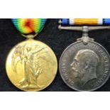 115804 PTE G MAY MGC, a British WWI medal pair comprising BWM and Victory medal. P&P Group 1 (£14+