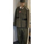 German WWII SS representation uniform, near-complete comprising badged and buttoned tunic with
