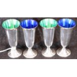 Four continental sterling silver shot cups with coloured interiors, marked ALVIN STERLING, each H: 7