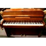 Royalette 1950s overstrung mahogany cased piano of small proportions having seven octaves. Not