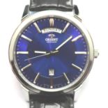 Gents Orient blue dial day and date wristwatch, new and boxed. Dial D: 35 mm. P&P Group 1 (£14+VAT