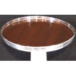 Sterling silver and mahogany circular tray, marked ALVIN STERLING, D: 16 cm. P&P Group 1 (£14+VAT