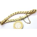 Heavy gauge 9ct gold link bracelet with safety chain, L: 18 cm, 25.6g. P&P Group 1 (£14+VAT for