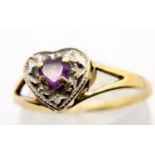 9ct gold heart shaped ring set with purple stone and diamonds, size M/N, 1.3g. P&P Group 1 (£14+