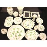 Wedgwood, sixteen items of Wild Strawberry pattern ceramics including picture frames, vases, covered