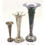 Two hallmarked silver trumpet vases, weighted and another, mixed assay marks, largest H: 15 cm. P&