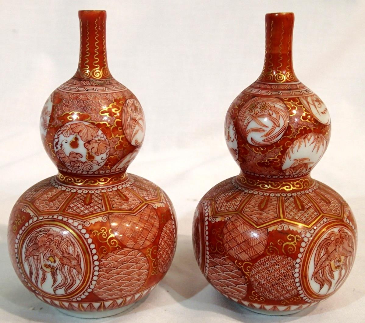 Pair of Meiji period small Japanese Kutani double gourd vases with signatures to base, each H: 11