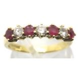 18ct gold ruby and diamond set ring, size N, 3.6g. P&P Group 1 (£14+VAT for the first lot and £1+VAT