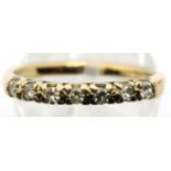9ct gold diamond ring set with seven stones, size N, 2.0g. P&P Group 1 (£14+VAT for the first lot