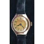 9ct yellow gold ladies Record wristwatch on a leather strap with original box. P&P Group 1 (£14+