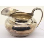 Hallmarked silver cream jug 202g, L: 13 cm, London assay 1964/5. P&P Group 1 (£14+VAT for the