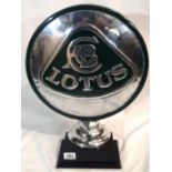 Large Chromed Lotus sign on wooden base, H: 51 cm. P&P Group 3 (£25+VAT for the first lot and £5+VAT