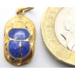 Presumed gold unmarked carved lapis lazuli scarab pendant, L: 40 mm, 1.7g. P&P Group 1 (£14+VAT