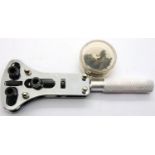 Adjustable stainless steel screw back watch remover with various sized pins. P&P Group 1 (£14+VAT