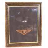 Framed Bentley badges, white metal and sewn, overall 25 x 30 cm. P&P Group 3 (£25+VAT for the